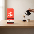 The three flavoured coffees in use on a kitchen counter