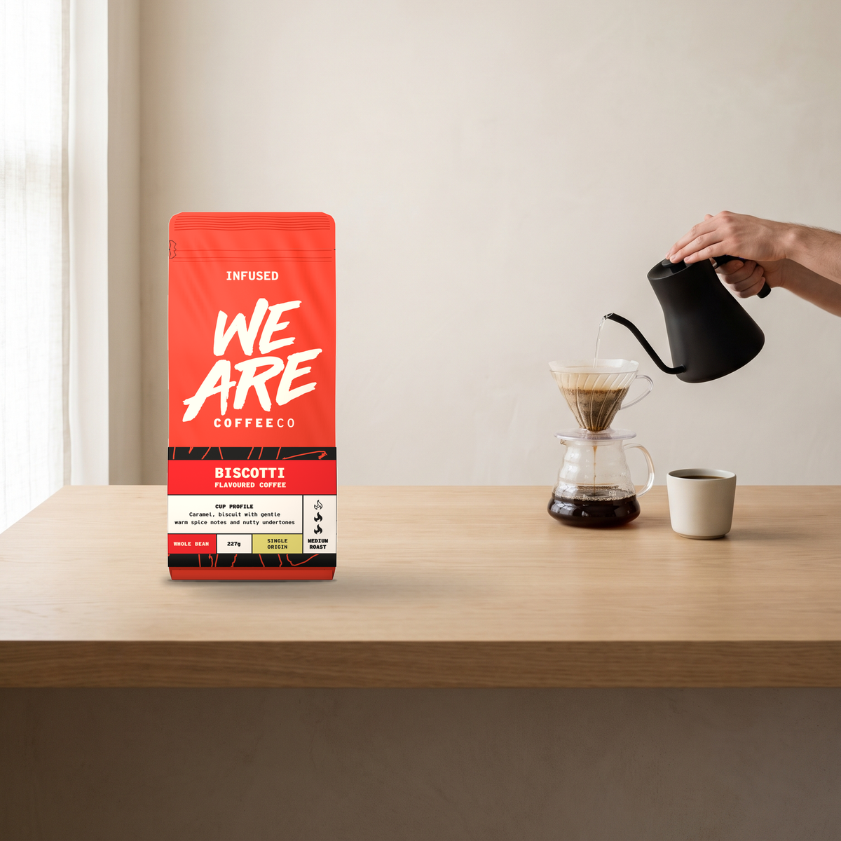 The three flavoured coffees in use on a kitchen counter