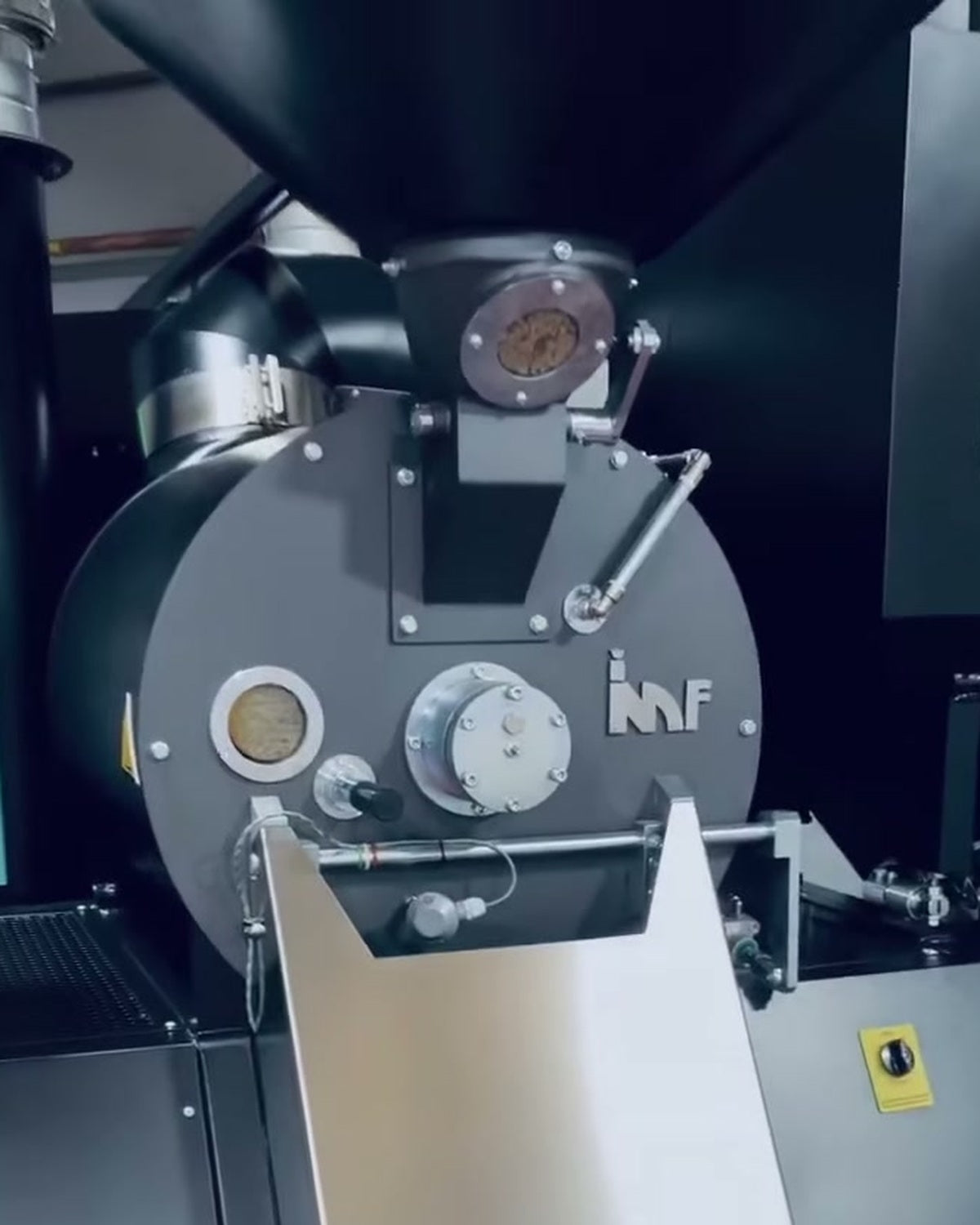 IMF coffee roaster with its inspection window, front controls and cooling tray.